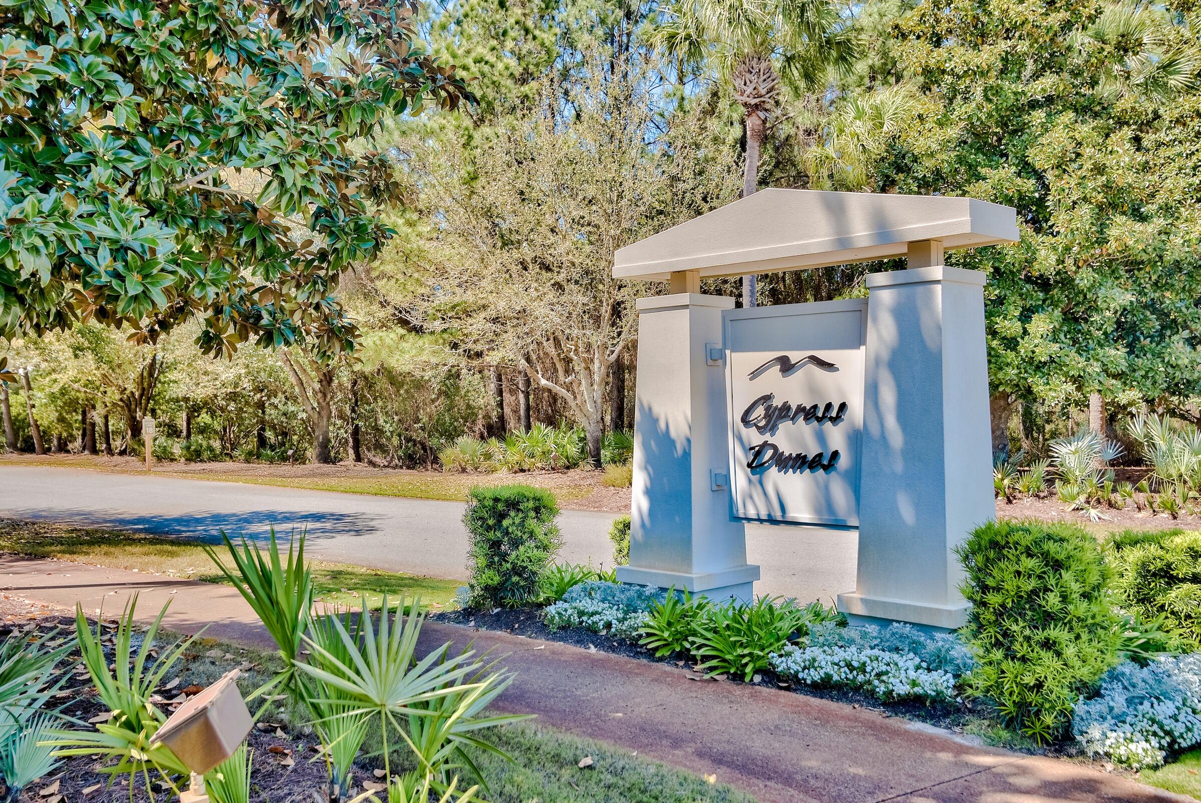 26 Cypress Walk Santa Rosa Beach, FL 32459 - Photo 4 of 57 an outdoor space with seating area and trees