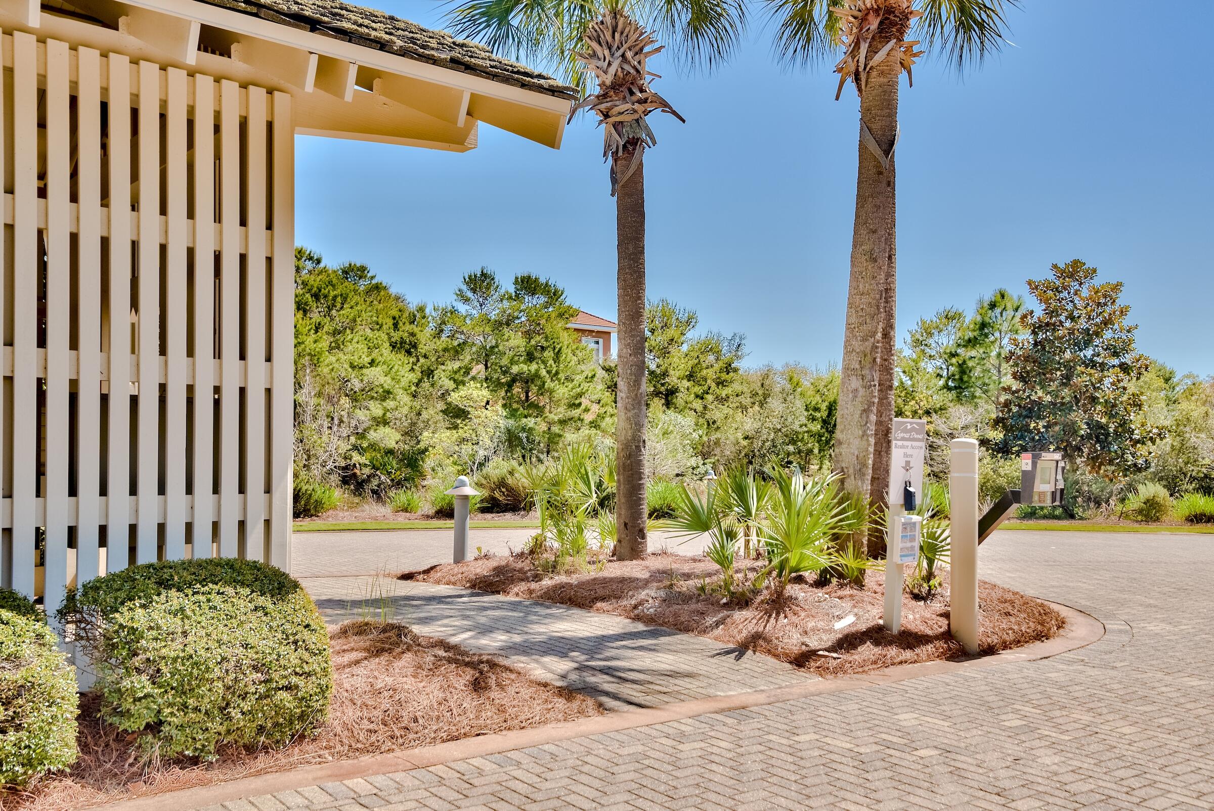 26 Cypress Walk Santa Rosa Beach, FL 32459 - Photo 9 of 57 a view of a backyard with plants