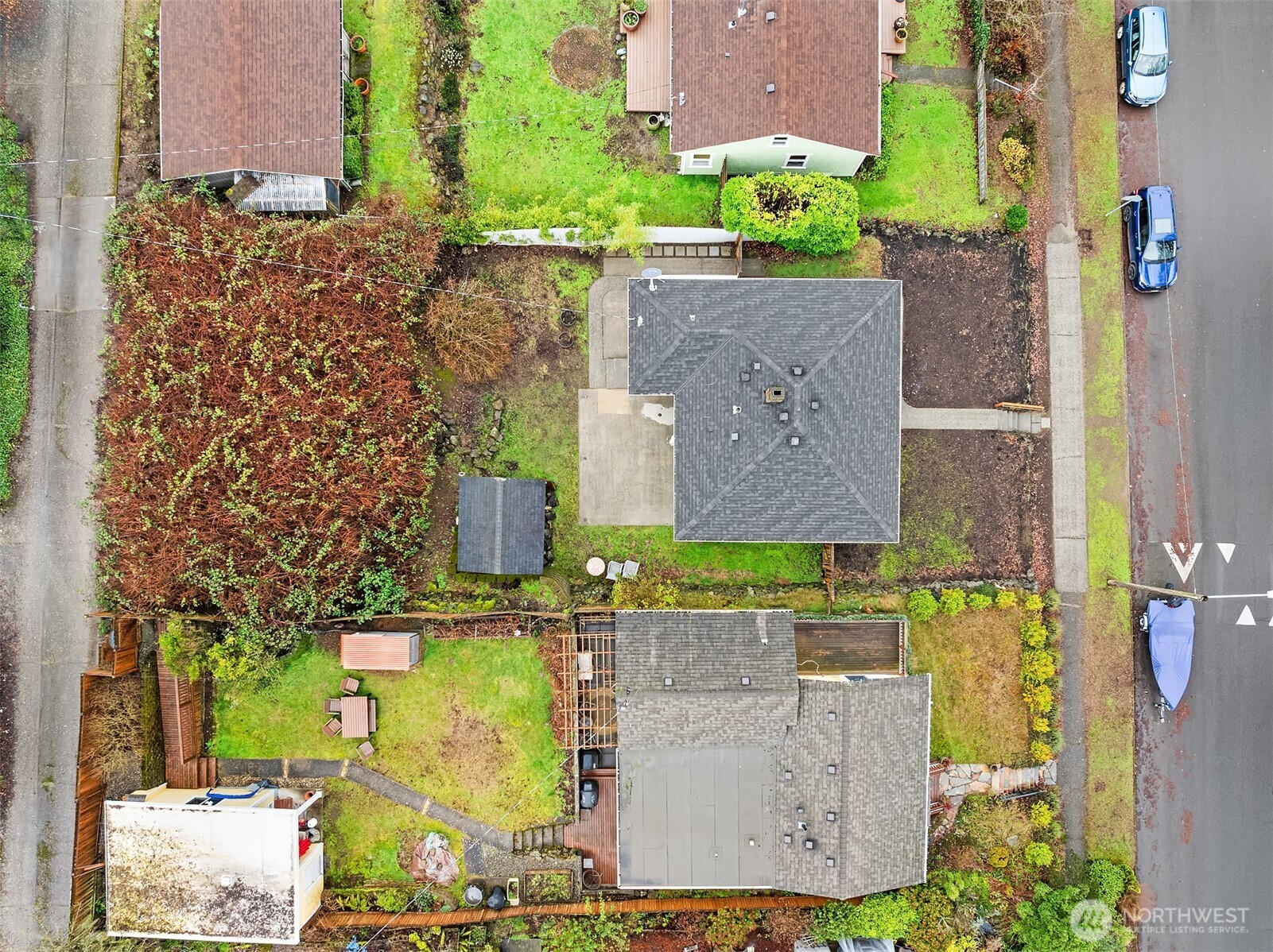 6741 34th Avenue Southwest Seattle, WA 98126 - Photo 19 of 25 aerial view of a house with a garden