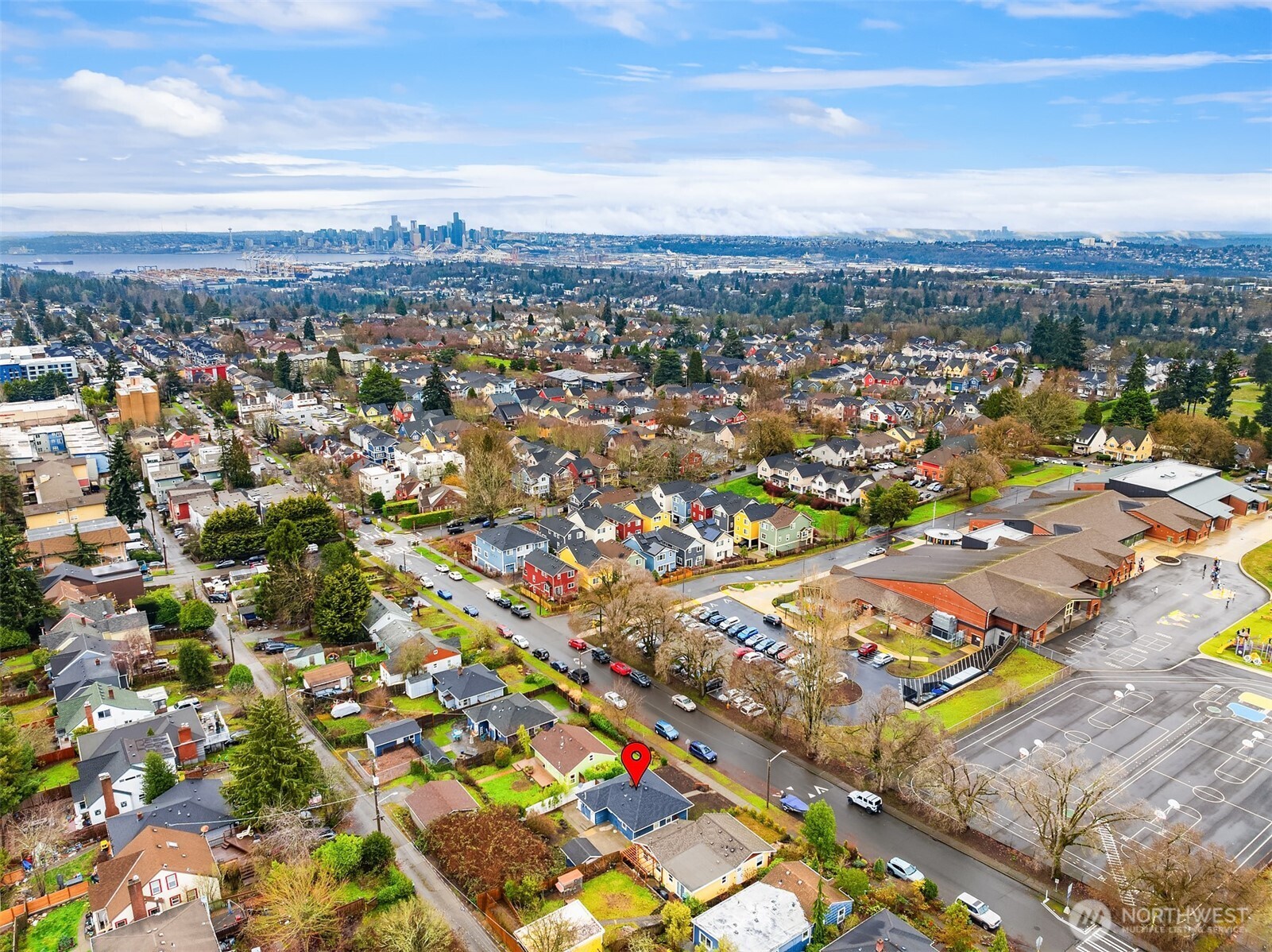6741 34th Avenue Southwest Seattle, WA 98126 - Photo 20 of 25 an aerial view of residential houses with outdoor space