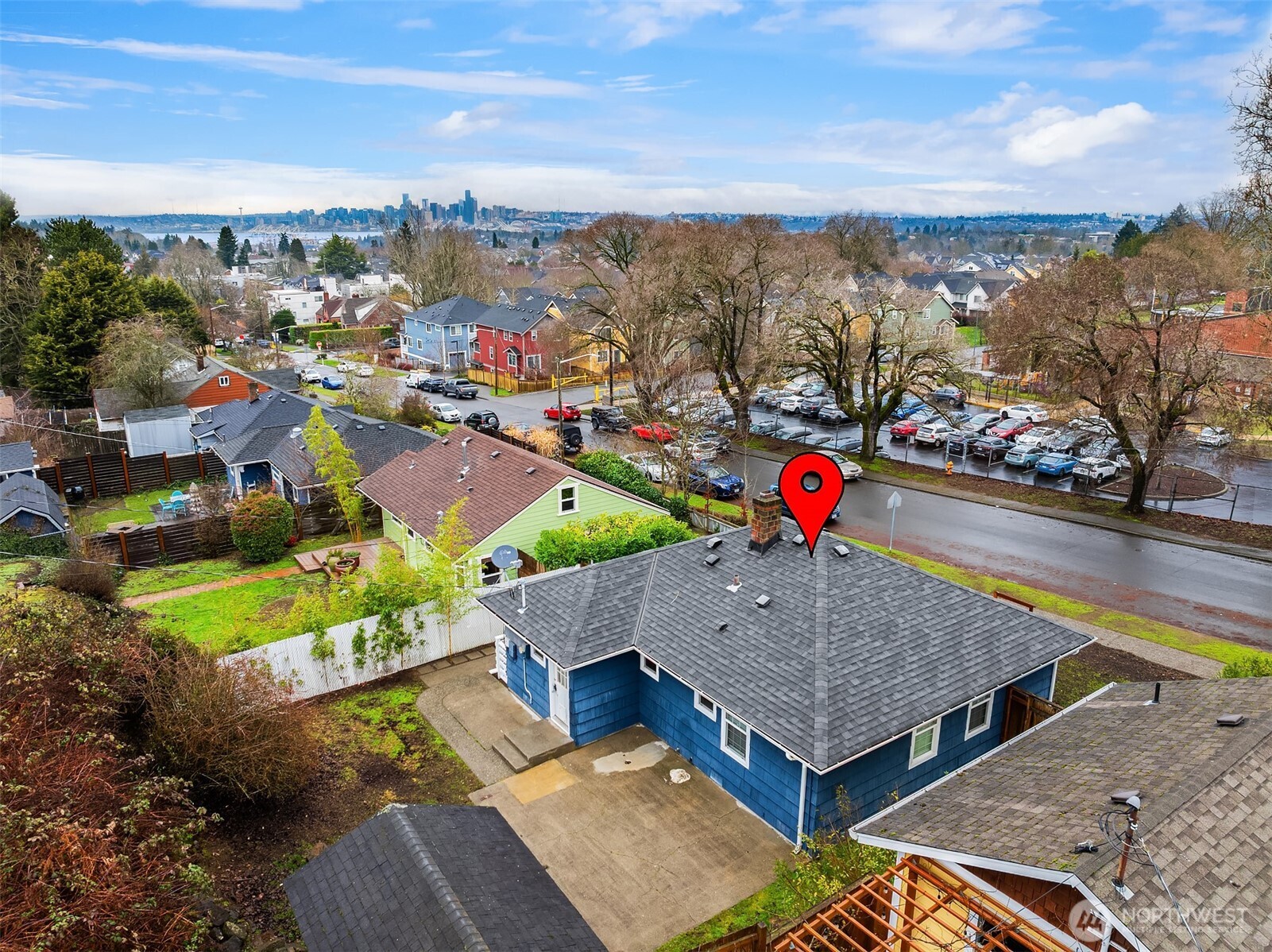 6741 34th Avenue Southwest Seattle, WA 98126 - Photo 25 of 25 an aerial view of a house with a garden and lake view