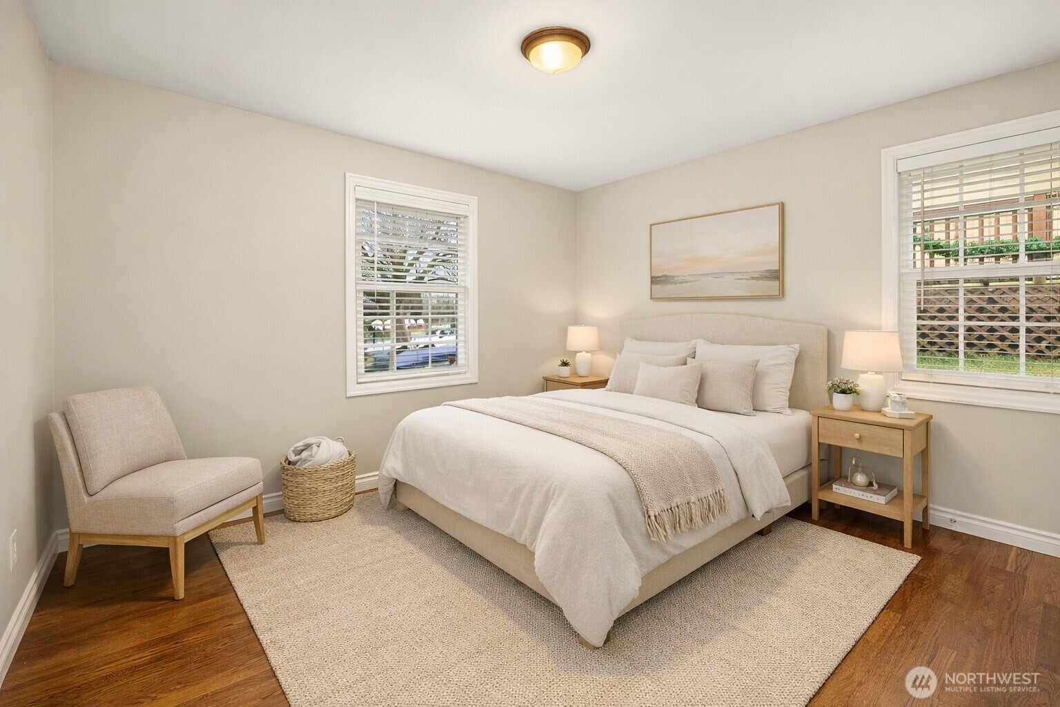 6741 34th Avenue Southwest Seattle, WA 98126 - Photo 6 of 25 a bedroom with a bed chair and a window