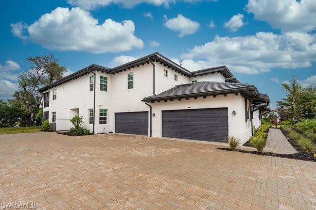 16907 Fairgrove Way, Unit 201 Naples, FL 34110 - Photo 2 of 28