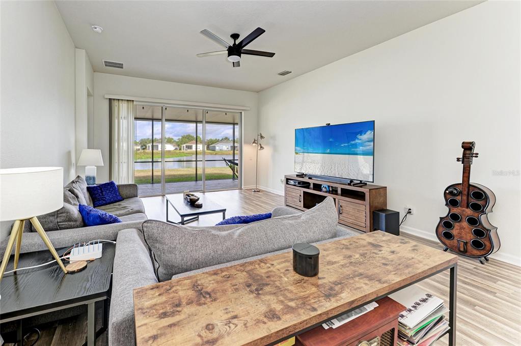 9950 52nd Street East Parrish, FL 34219 - Photo 19 of 48 a living room with furniture and a window