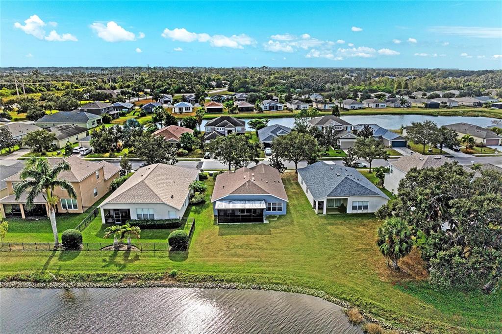 9950 52nd Street East Parrish, FL 34219 - Photo 23 of 48 a view of a house with yard and lake view