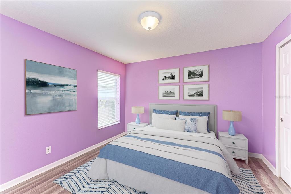 9950 52nd Street East Parrish, FL 34219 - Photo 34 of 48 a bedroom with a bed and a window