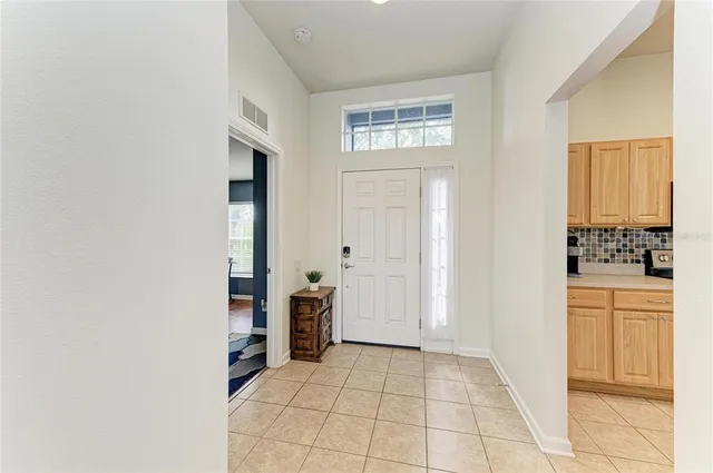 a view of kitchen with furniture and window