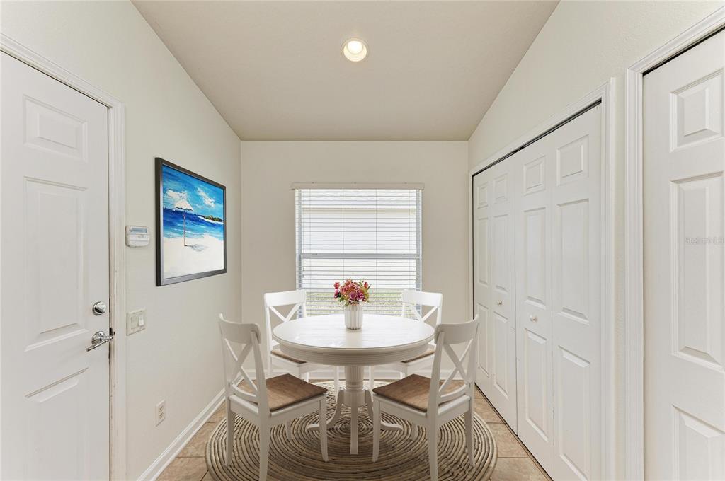 9950 52nd Street East Parrish, FL 34219 - Photo 10 of 48 a dining room with furniture and window