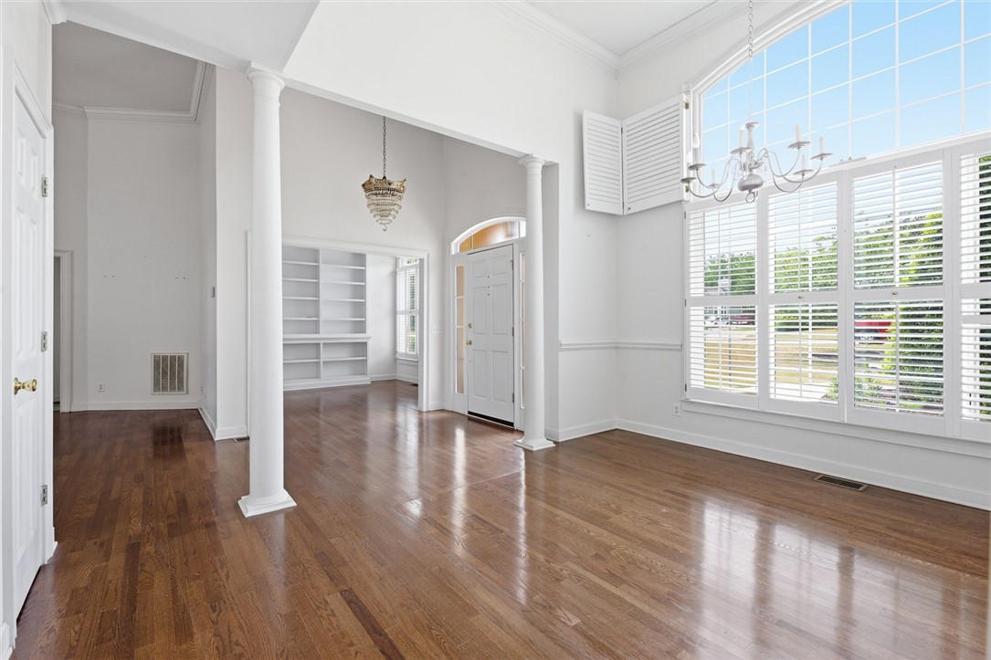 110 Garden Gate Drive Anderson, SC 29621 - Photo 9 of 35 This grand foyer welcomes you with soaring ceilings and gleaming hardwood floors.