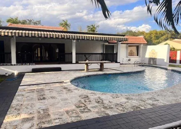 a white refrigerator freezer sitting inside of a kitchen