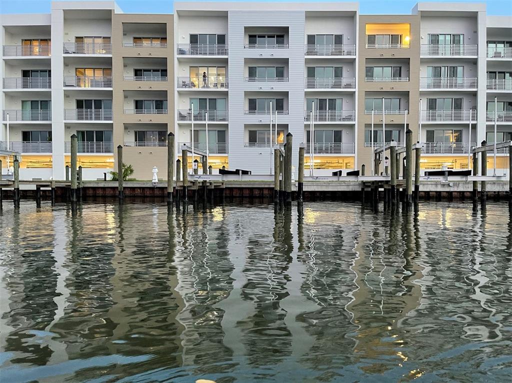1709 North Tamiami Trail, Unit 213 Sarasota, FL 34234 - Photo 2 of 49 a view of a lake view with a large window