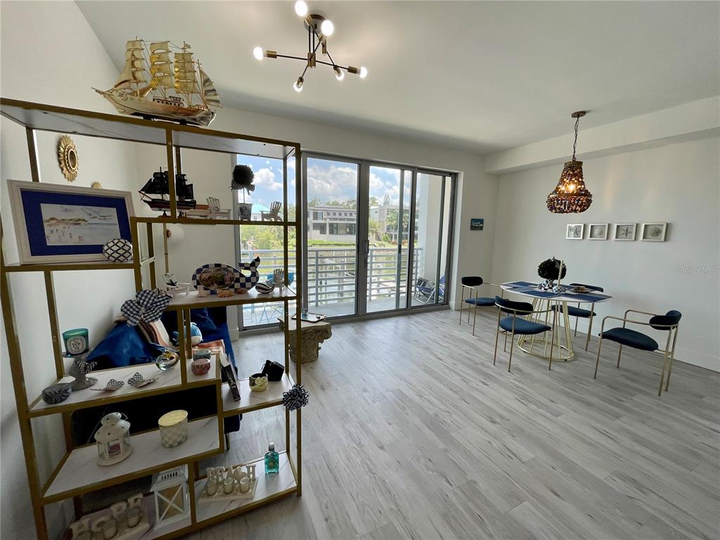 1709 North Tamiami Trail, Unit 213 Sarasota, FL 34234 - Photo 21 of 49 a view of a room with gym equipment