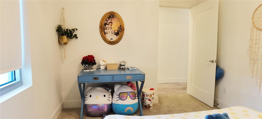 1709 North Tamiami Trail, Unit 213 Sarasota, FL 34234 - Photo 24 of 49 a view of entryway with wooden floor