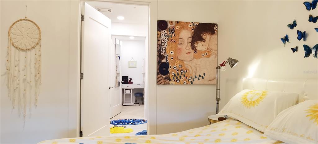 1709 North Tamiami Trail, Unit 213 Sarasota, FL 34234 - Photo 26 of 49 a bathroom with a sink and mirror