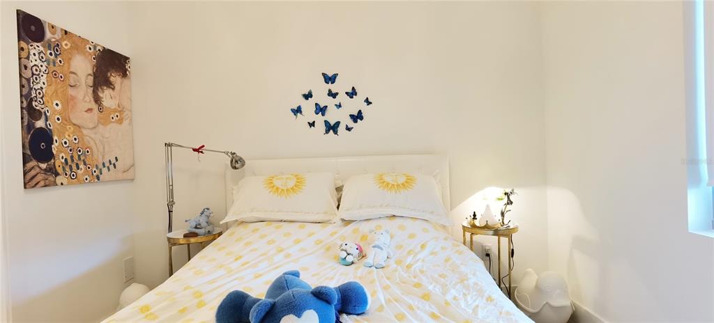 1709 North Tamiami Trail, Unit 213 Sarasota, FL 34234 - Photo 29 of 49 a dining room with wooden floor