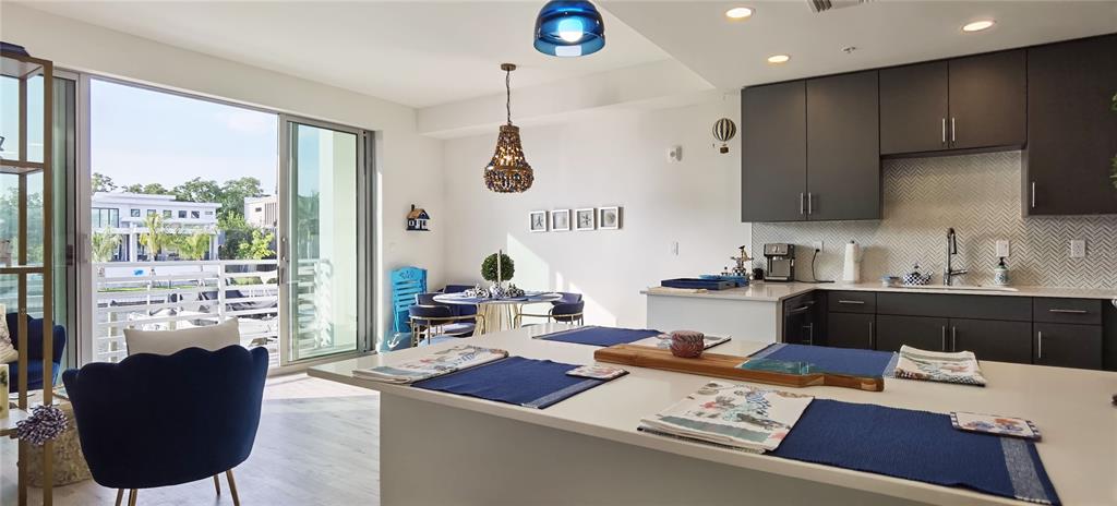 1709 North Tamiami Trail, Unit 213 Sarasota, FL 34234 - Photo 35 of 49 a living room with furniture and a window