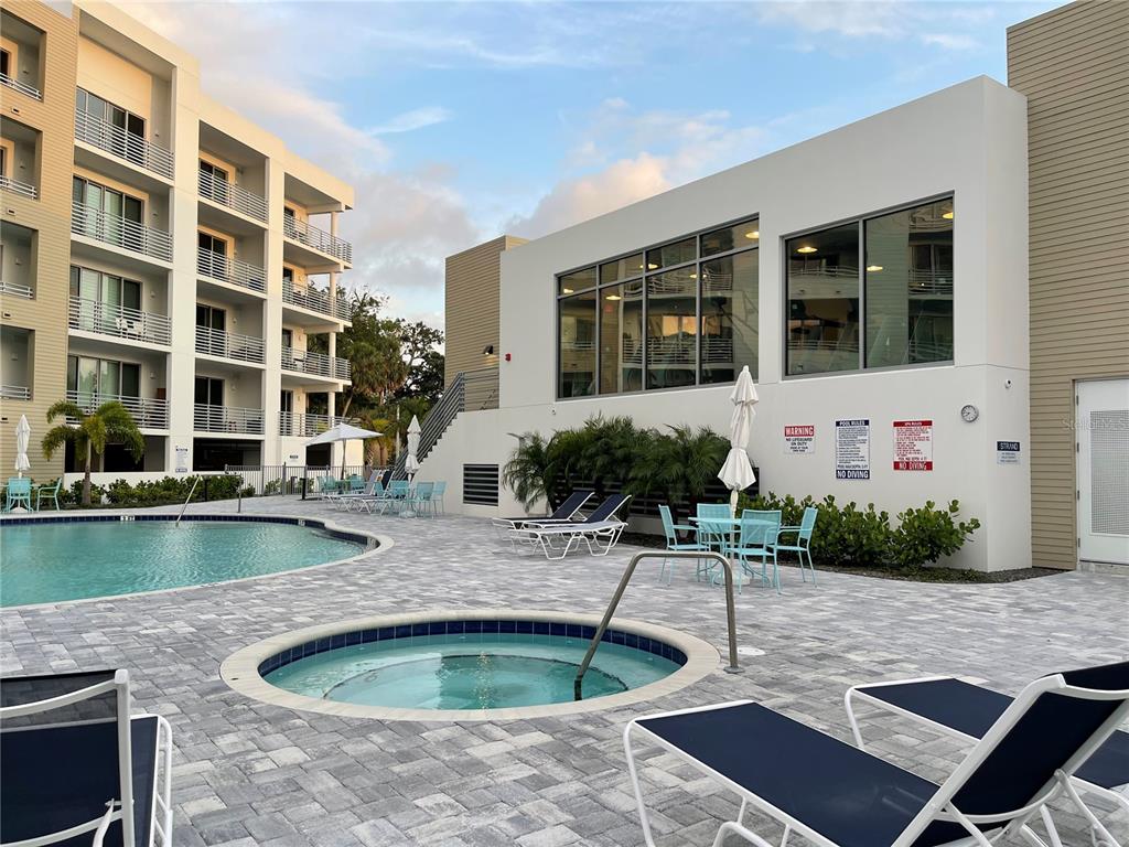 1709 North Tamiami Trail, Unit 213 Sarasota, FL 34234 - Photo 5 of 49 a view of building with outdoor space