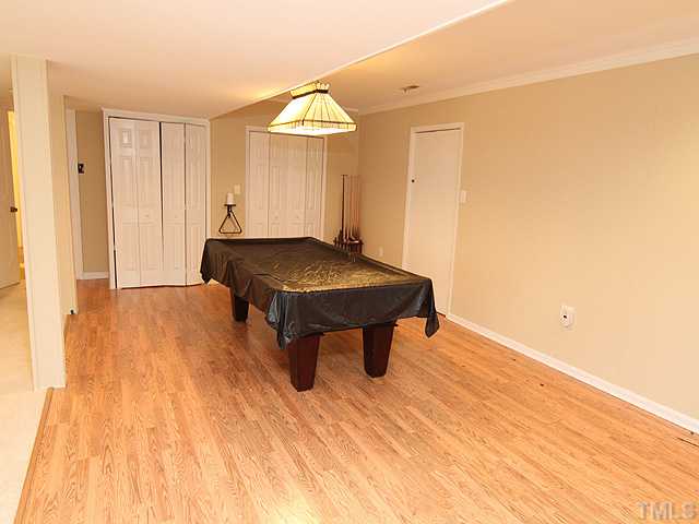 8644 Valley Brook Drive Raleigh, NC 27613 - Photo 11 of 18 REC ROOM: Pool anyone? This room opens to the family room!