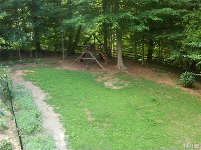 8644 Valley Brook Drive Raleigh, NC 27613 - Photo 15 of 18 BACKYARD: Great wooded backyard!