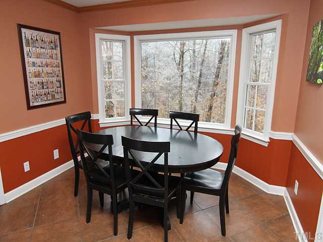 8644 Valley Brook Drive Raleigh, NC 27613 - Photo 4 of 18 BREAKFAST AREA: Light and airy with a great view of the backyard!