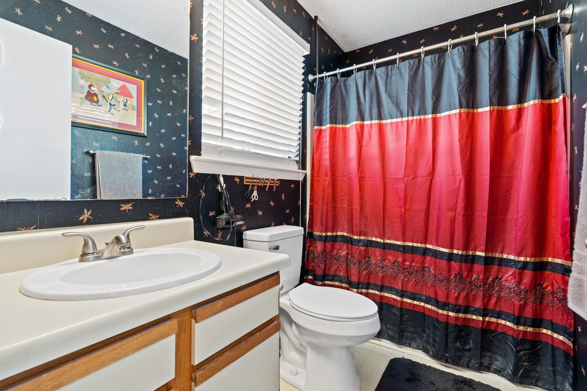 220 Myrtle Greens Drive, Unit I Conway, SC 29526 - Photo 14 of 30 Bathroom featuring wallpapered walls, a shower with shower curtain, and vanity