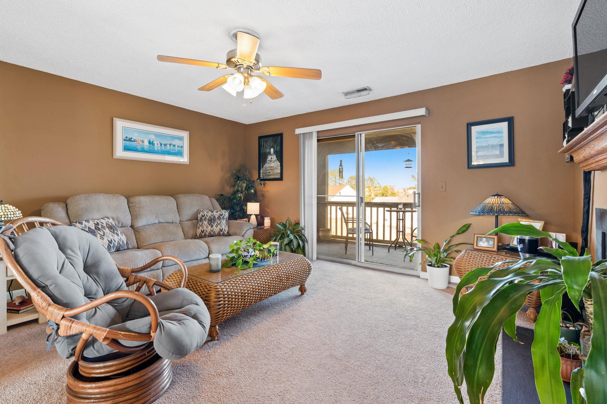 220 Myrtle Greens Drive, Unit I Conway, SC 29526 - Photo 3 of 30 Living room featuring carpet and ceiling fan