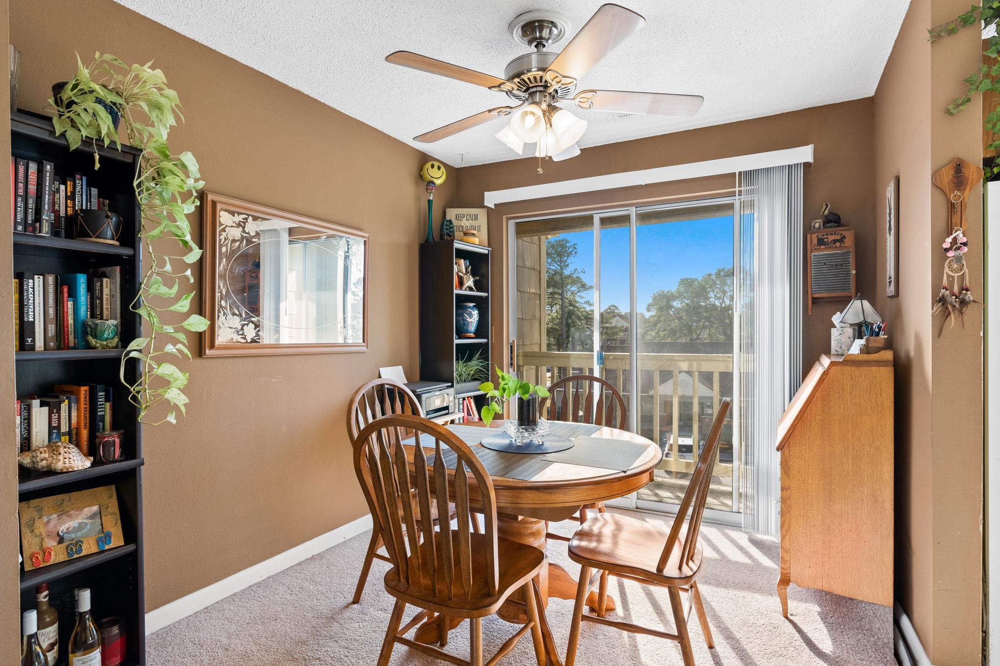 220 Myrtle Greens Drive, Unit I Conway, SC 29526 - Photo 7 of 30 Carpeted dining space with ceiling fan and a textured ceiling