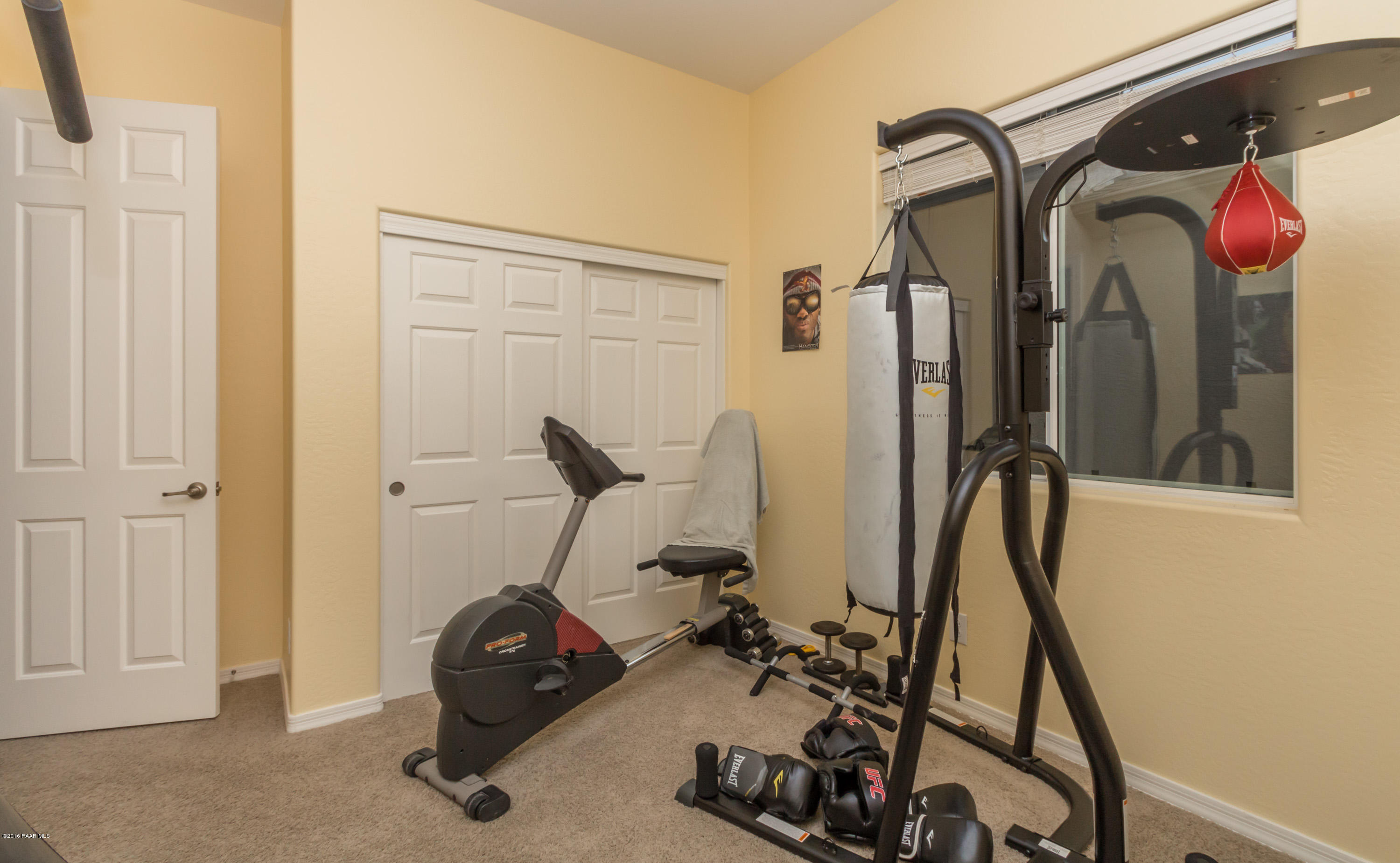 7887 East Mesteno Road Prescott Valley, AZ 86315 - Photo 18 of 30 a view of a room with gym equipment