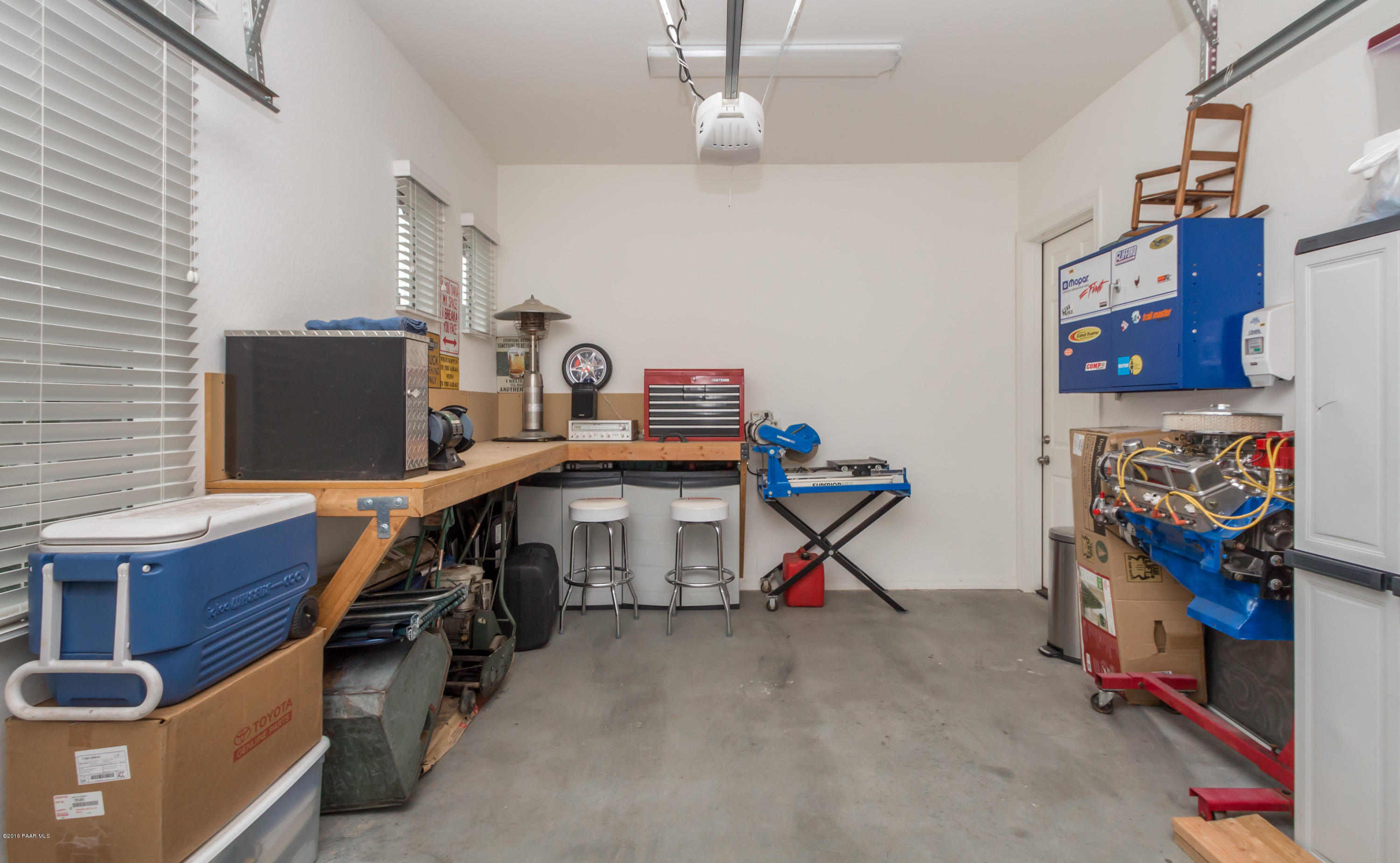 7887 East Mesteno Road Prescott Valley, AZ 86315 - Photo 27 of 30 a view of a workspace with furniture