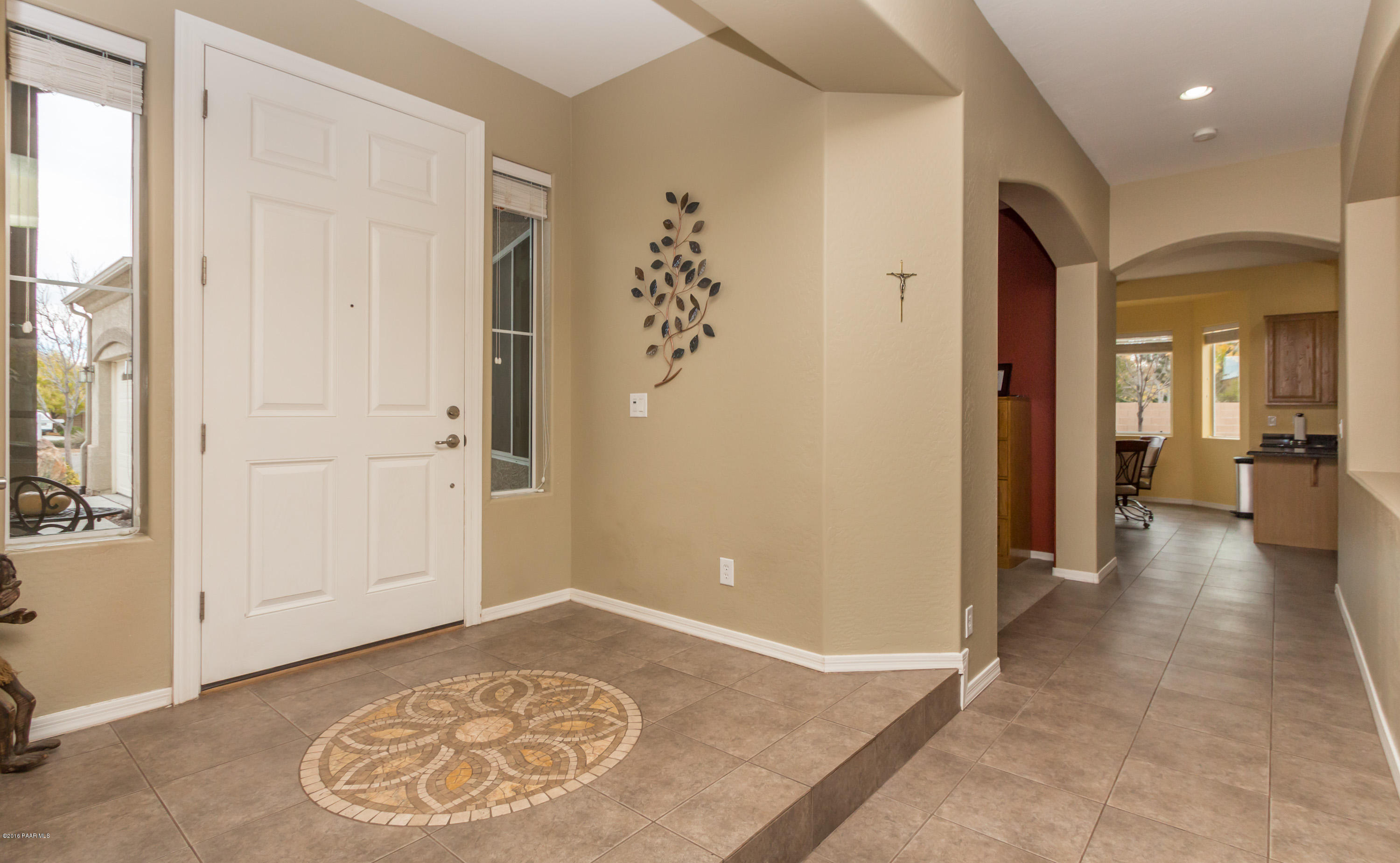 7887 East Mesteno Road Prescott Valley, AZ 86315 - Photo 3 of 30 wooden floor with a chandelier