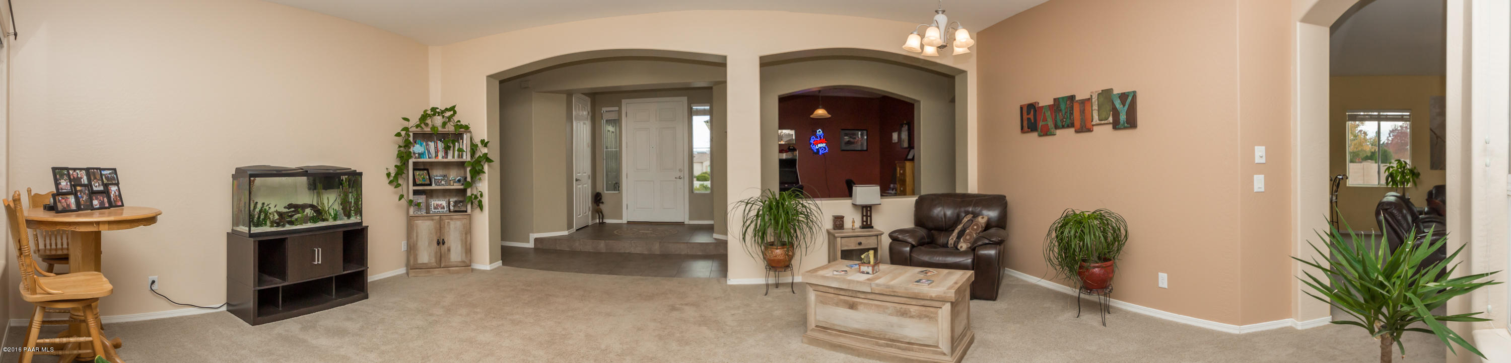7887 East Mesteno Road Prescott Valley, AZ 86315 - Photo 4 of 30 a view of an entryway with wooden floor