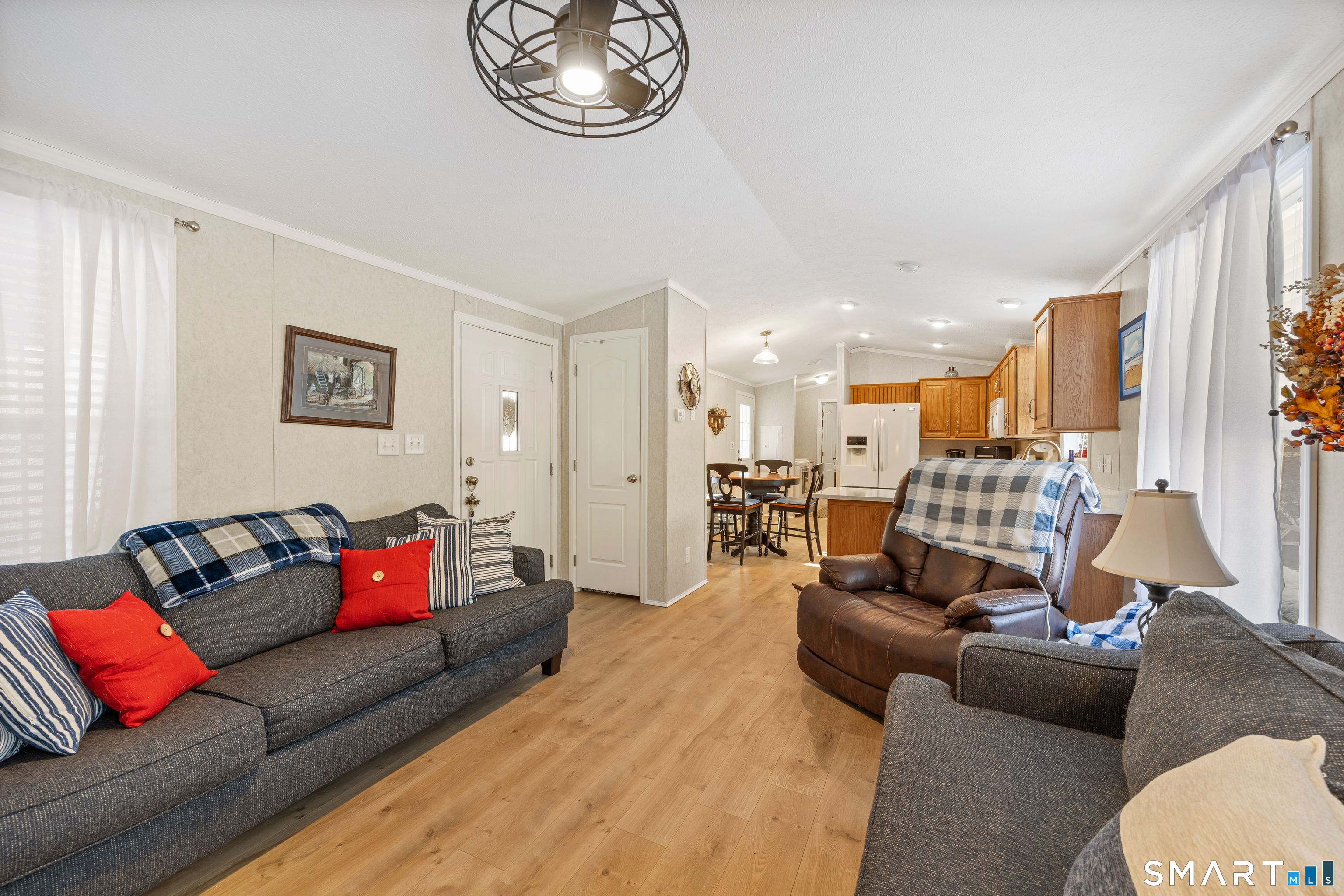10 Meadow Road Southington, CT 06489 - Photo 7 of 23 a living room with furniture or couch and a chandelier