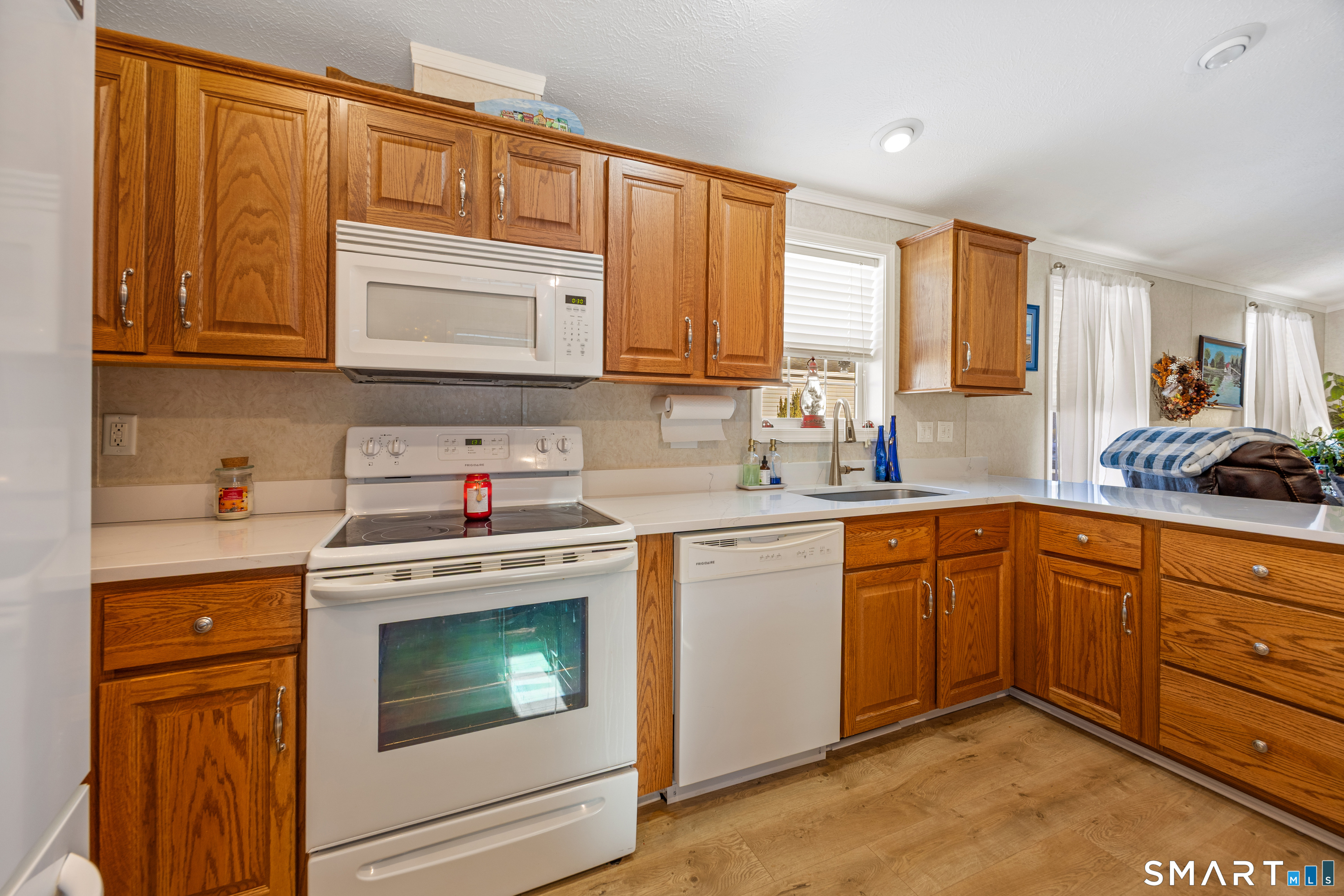 10 Meadow Road Southington, CT 06489 - Photo 9 of 23 a kitchen with granite countertop cabinets stainless steel appliances and sink