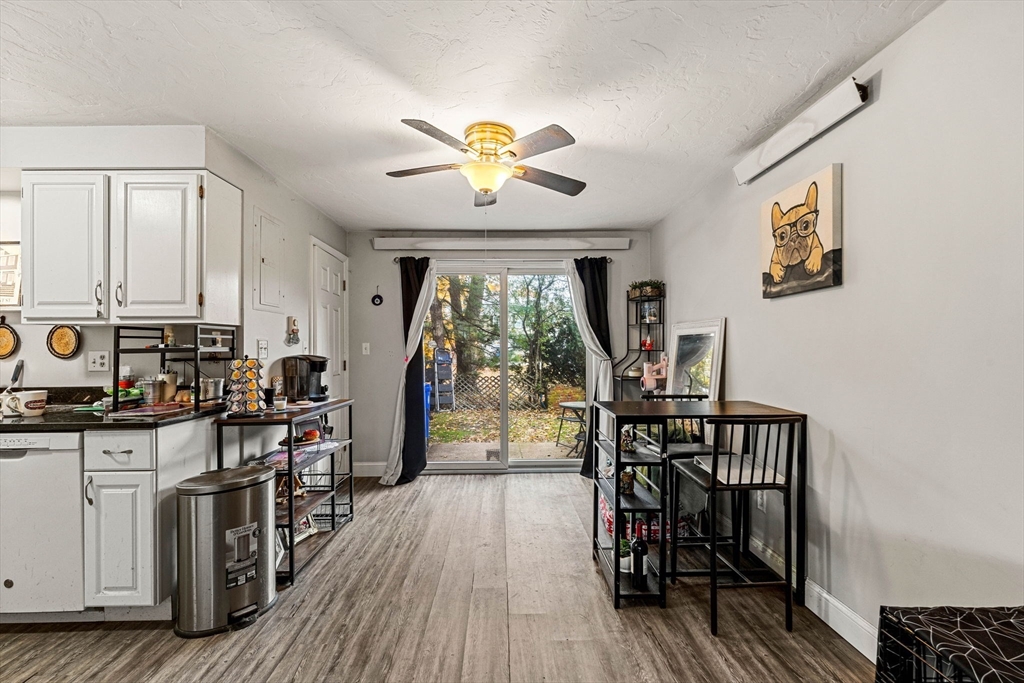 23 Magnolia Street, Unit 2 Attleboro, MA 02703 - Photo 11 of 32 a view of a dining room with furniture window and wooden floor