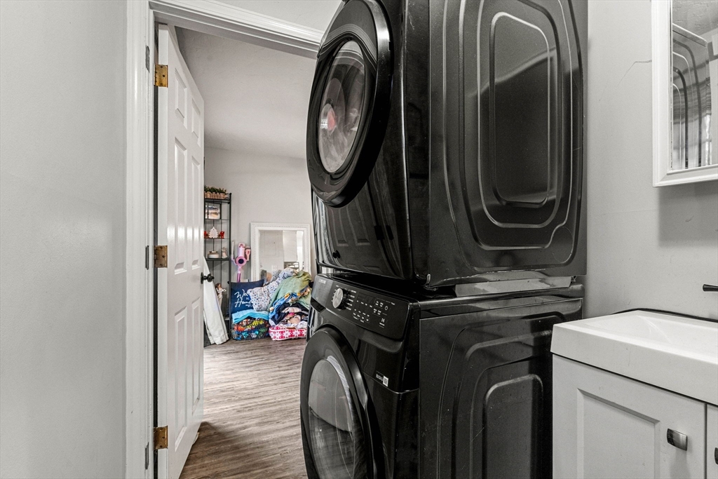 23 Magnolia Street, Unit 2 Attleboro, MA 02703 - Photo 16 of 32 a view of hallway with washer and dryer