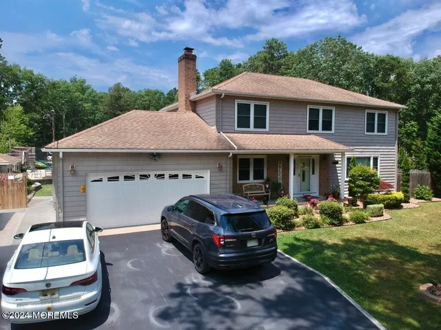 a car parked in front of a house