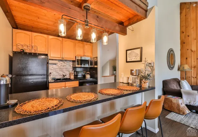 a view of a living room with a stove