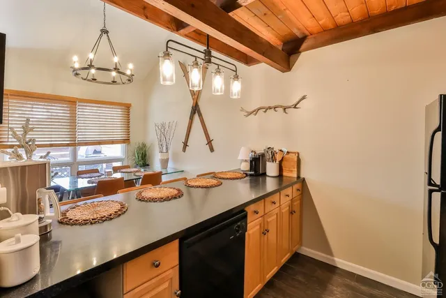 a very nice looking living room with a large window