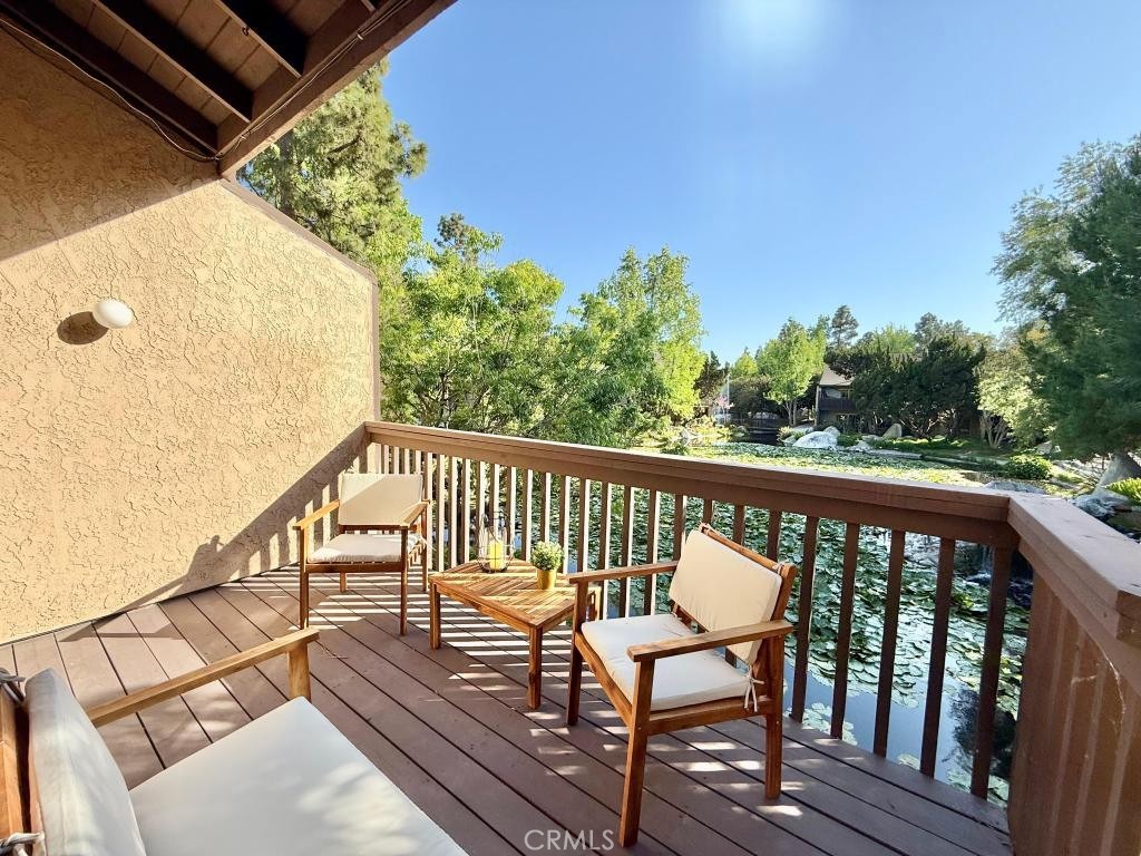 7890 East Spring Street, Unit 2F Long Beach, CA 90815 - Photo 13 of 64 a view of a two chairs in the balcony