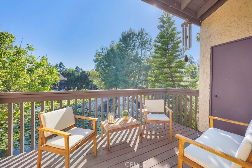 7890 East Spring Street, Unit 2F Long Beach, CA 90815 - Photo 14 of 64 a view of a two chairs in the balcony