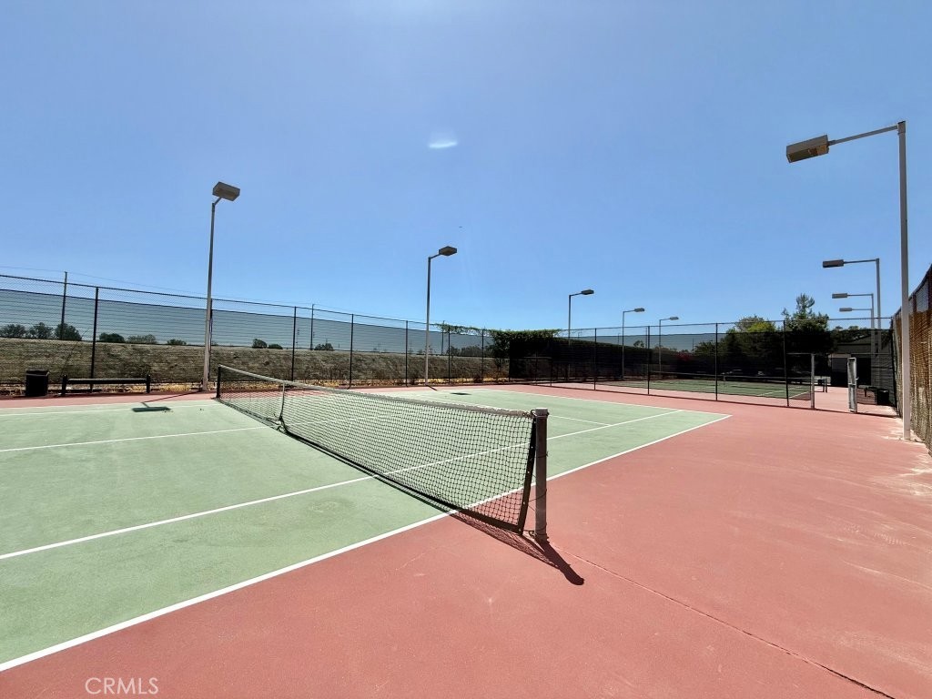 7890 East Spring Street, Unit 2F Long Beach, CA 90815 - Photo 27 of 64 a view of a tennis court