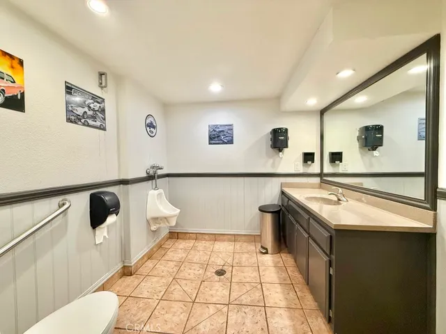 a bunch of flowers with white walls