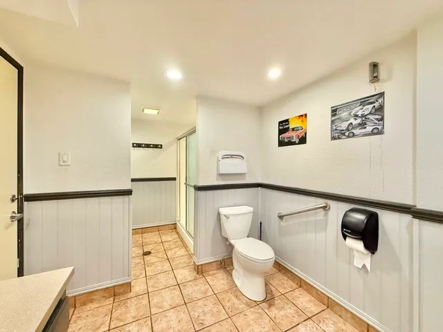 a backyard of a house with a yard and outdoor seating