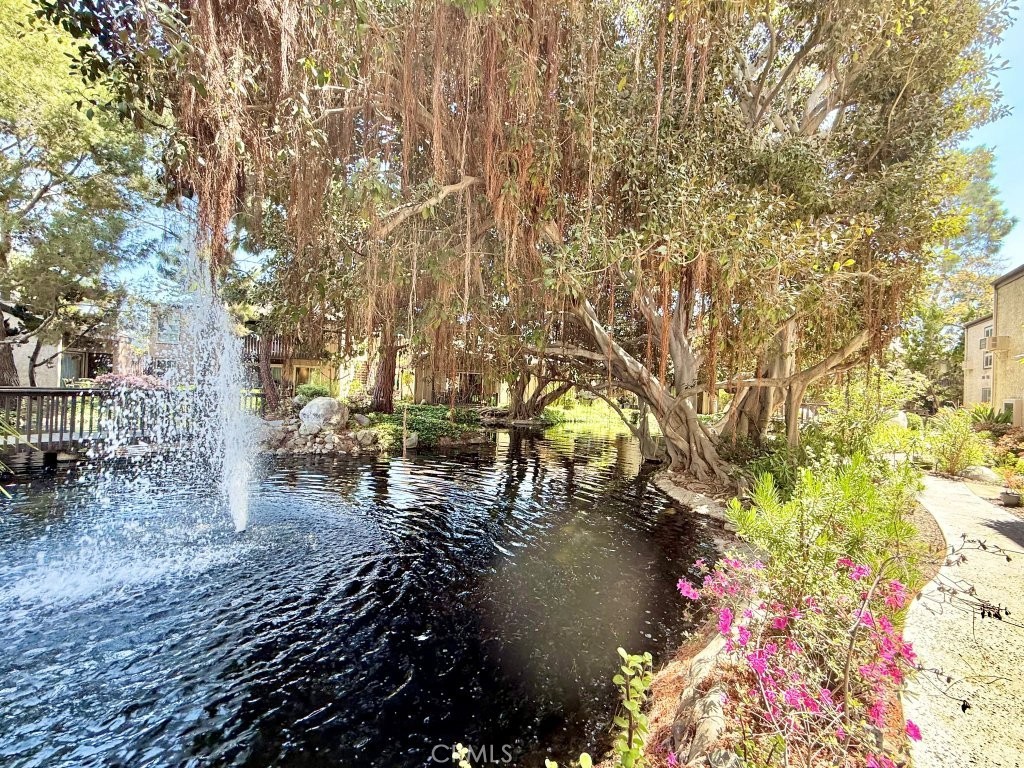 7890 East Spring Street, Unit 2F Long Beach, CA 90815 - Photo 49 of 64 a view of water with a tree in the background