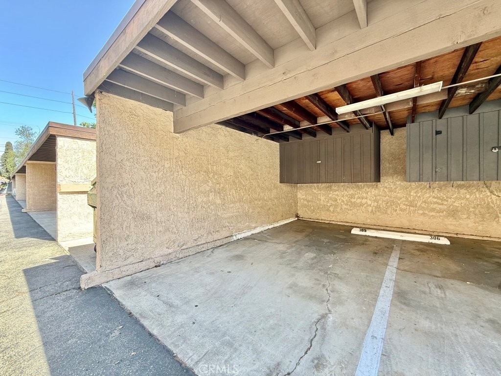 7890 East Spring Street, Unit 2F Long Beach, CA 90815 - Photo 50 of 64 an empty room with wooden floor