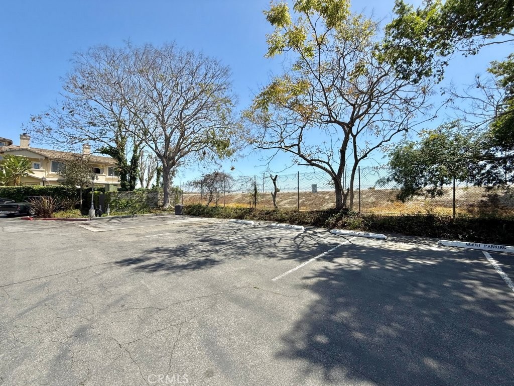 7890 East Spring Street, Unit 2F Long Beach, CA 90815 - Photo 57 of 64 a view of street with parked cars