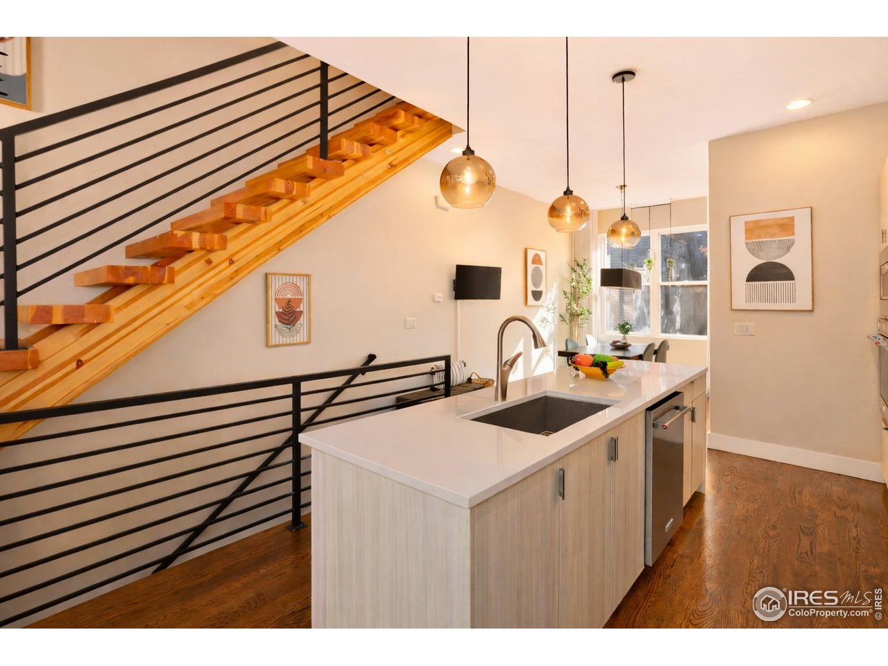 a kitchen view with a sink and dishwasher