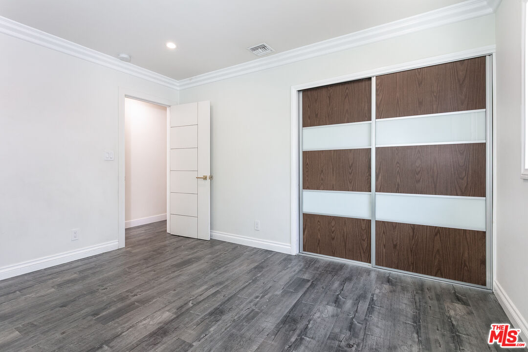 7001 Beckett Street Tujunga, CA 91042 - Photo 15 of 21 an empty room with wooden floor