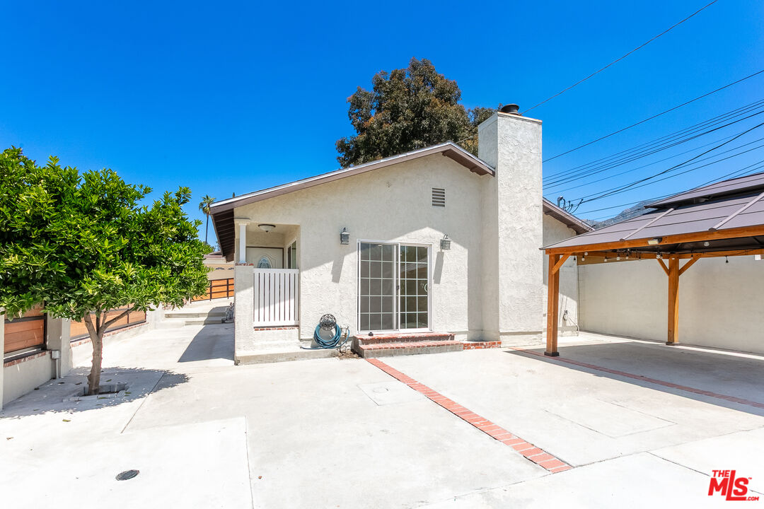 7001 Beckett Street Tujunga, CA 91042 - Photo 16 of 21 a view of a house with basketball court