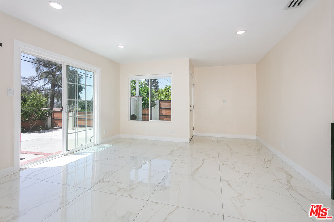7001 Beckett Street Tujunga, CA 91042 - Photo 4 of 21 a view of an empty room with a window